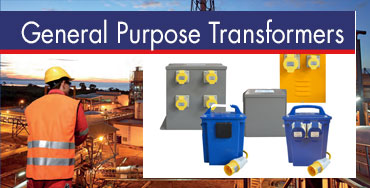 Engineer in safety gear stands near industrial site; transformers and power boxes are shown.