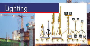 Various portable construction site lighting equipment shown in front of a building site background.